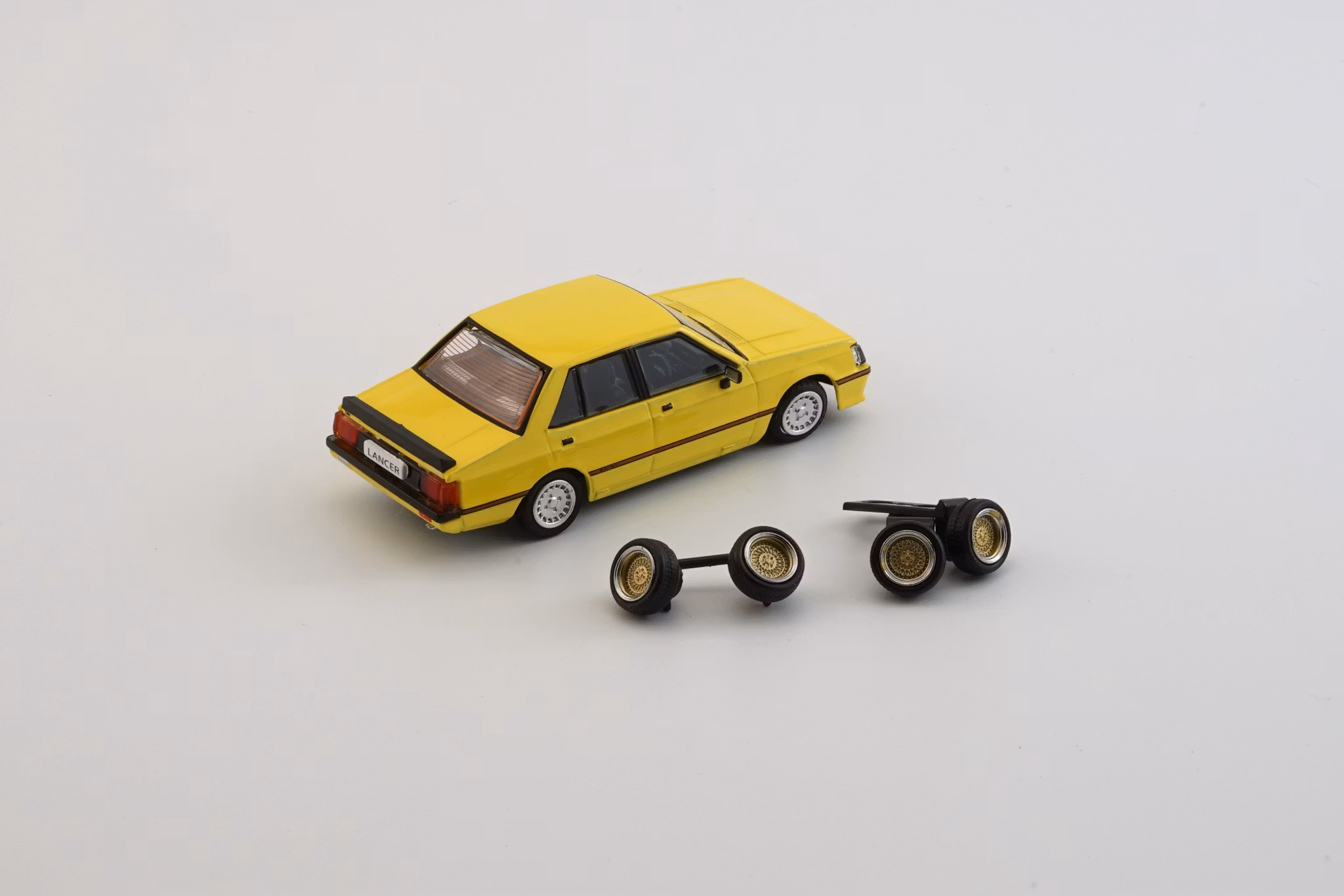 Skala 1/64 Mitsubishi Lancer EX2000 Turbo, Yellow fr BM Creations