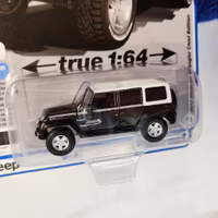 Skala 1/64 - Jeep JK Wrangler Chief Edition 17' Rel.3 Ver.B från Auto World