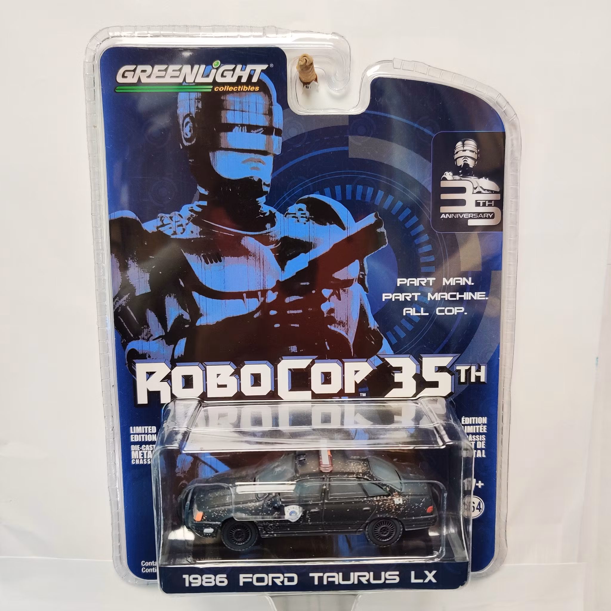 Skala 1/64 Ford Police Taurus 86' "Robocop 35th" fr Greenlight