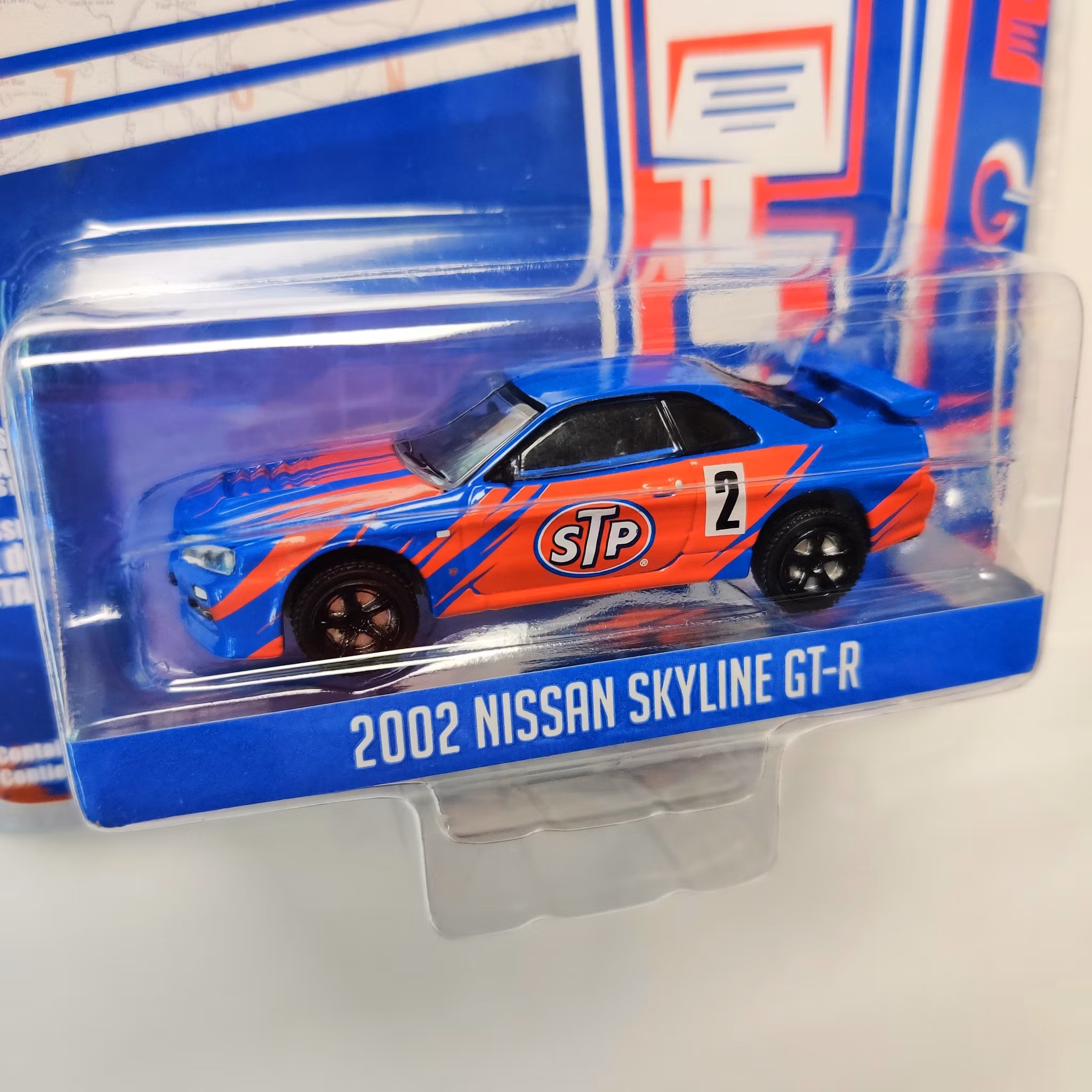 Skala 1/64 Nissan Skyline GT-R 2002 STP "Running on Empty" fr Greenlight