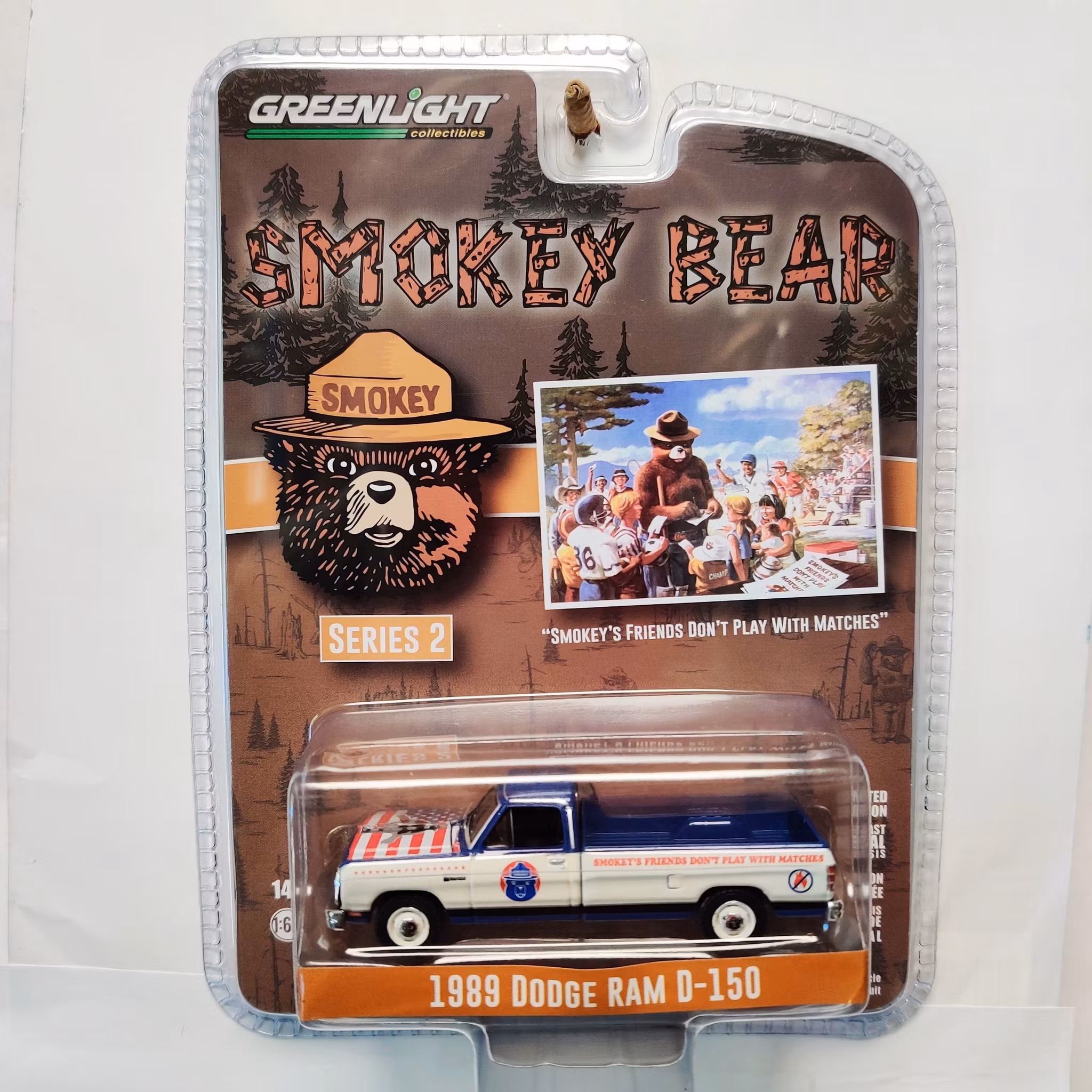 Skala 1/64 - Dodge RAM D-150 89' "Smokey Bear" Ser.2 fr GreenLight