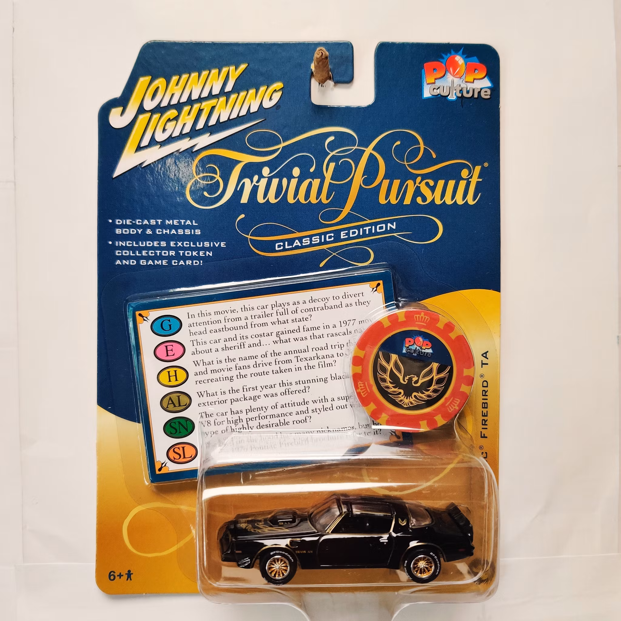 Skala 1/64 - Pontiac Firebird TA 77' "Trivial Pursuit - POP Culture" från Johnny Lightning