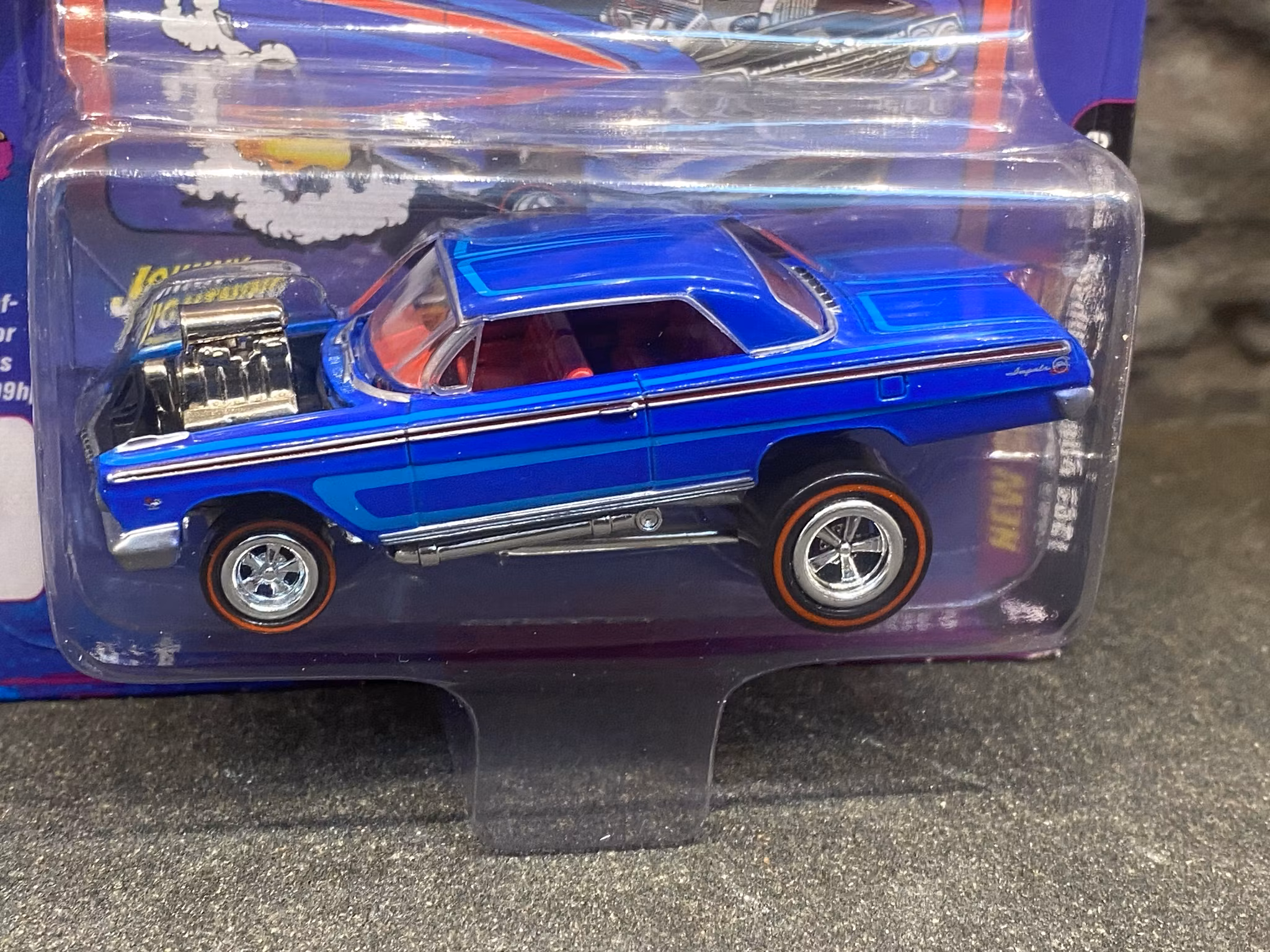 Skala 1/64 1962' Chevrolet Impala Coupe, Blue, "Zingers" fr Johnny Lightning