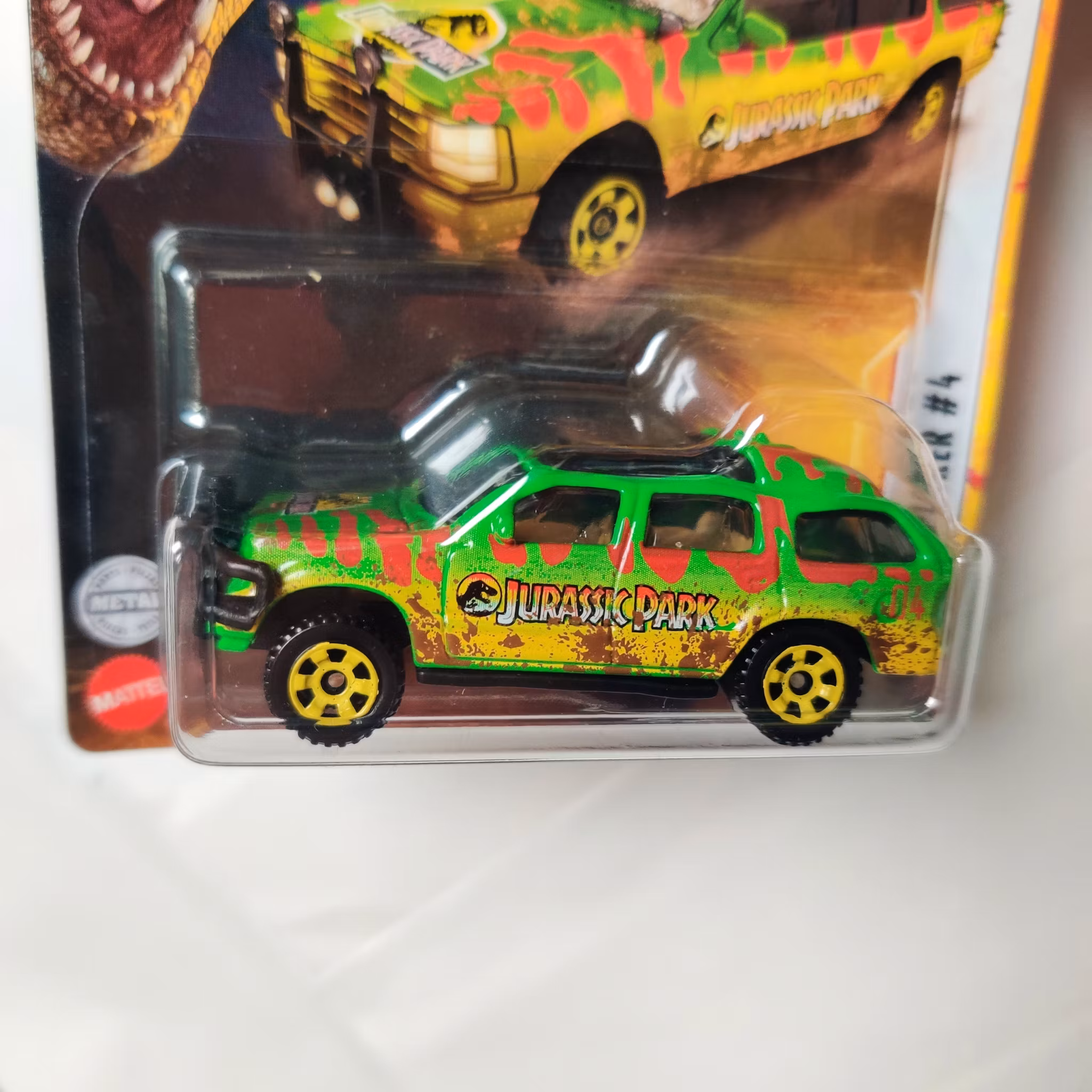 Skala 1/64 Matchbox: Ford Explorer 1993 #4 "Jurassic World"