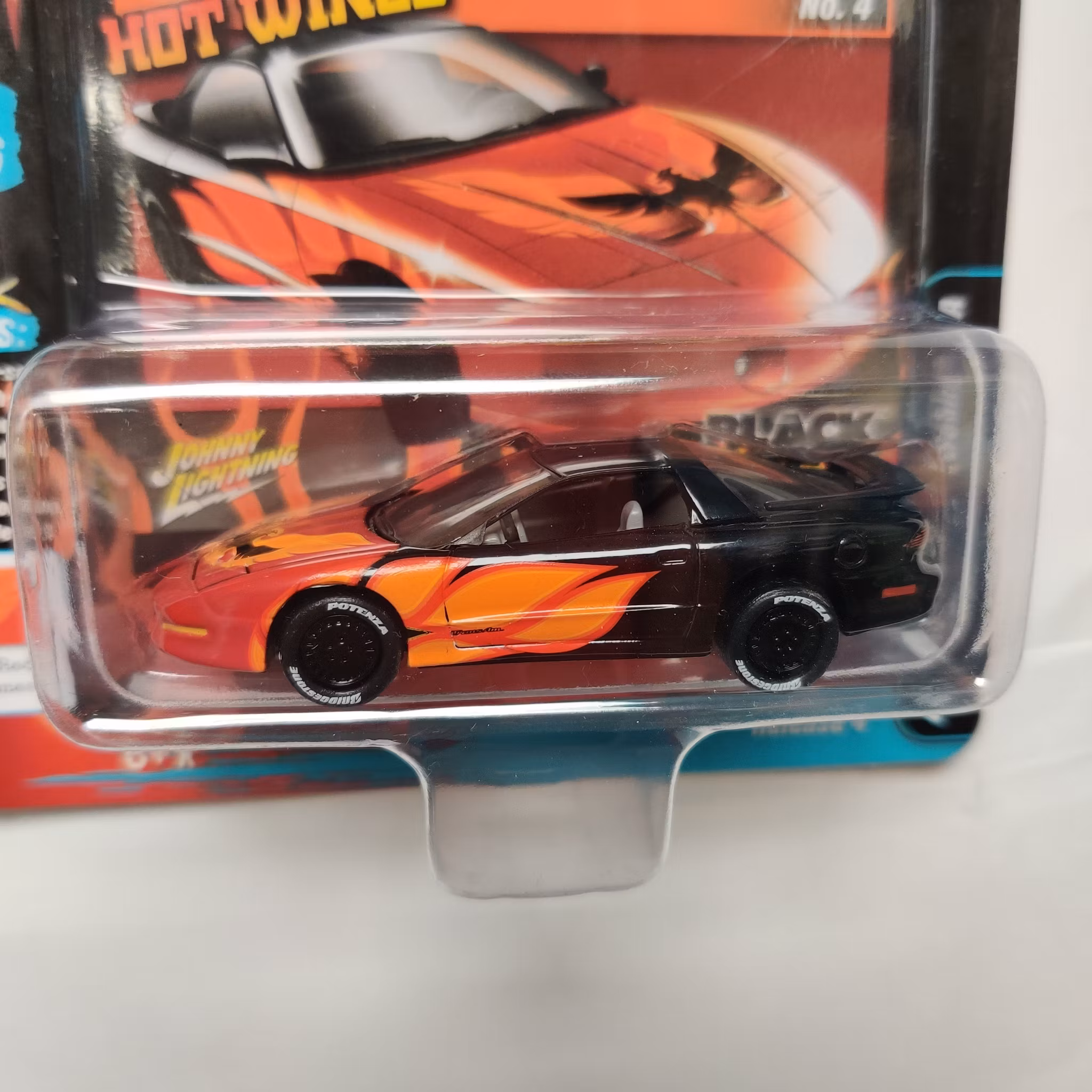 Skala 1/64 - Pontiac Firebird T/A 1993' "Black with Flames" Rel.4 fr Johnny Lightning