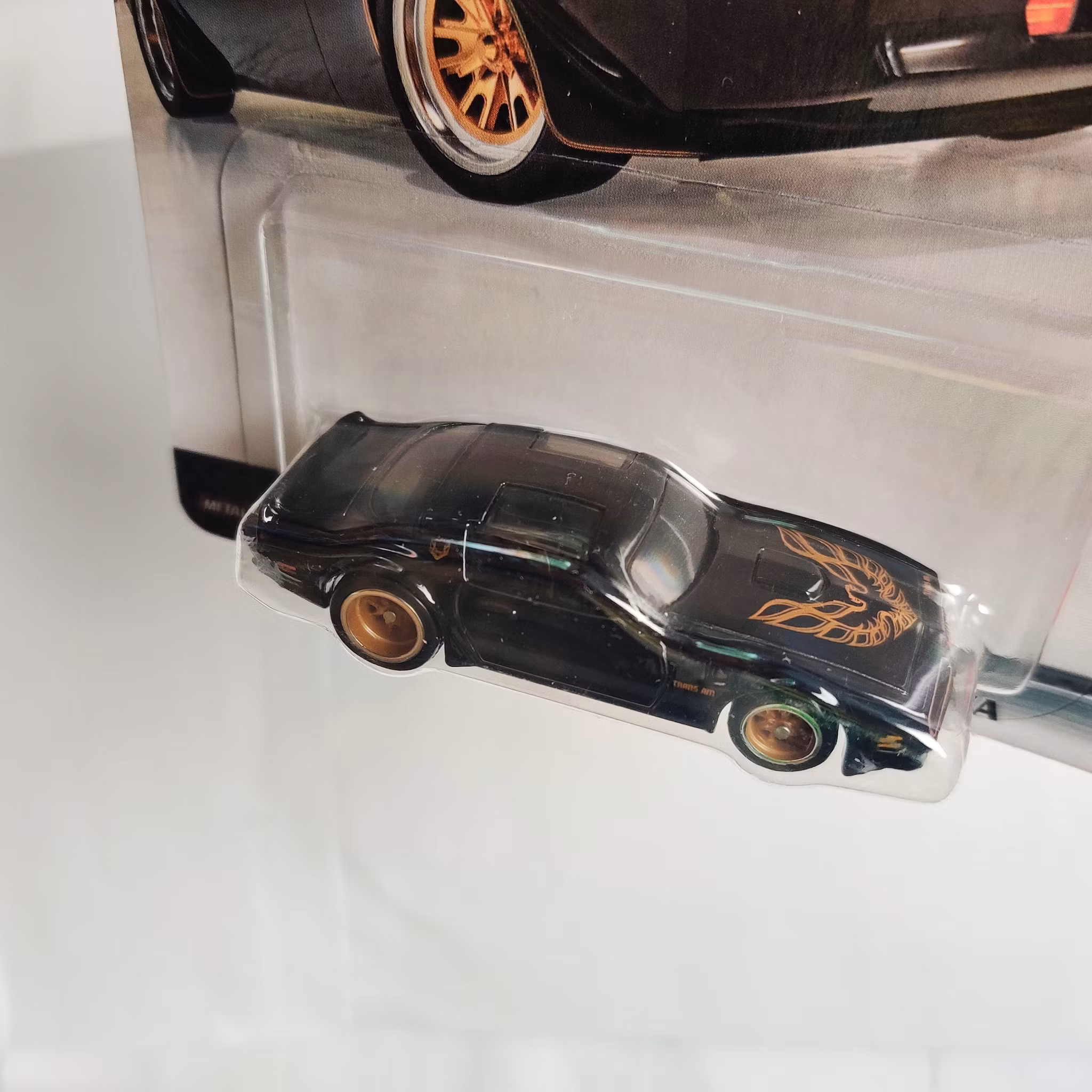 Skala 1/64 Hot Wheels PREMIUM - Fast & Furious - Pontiac Firebird T/A Trans Am 1977