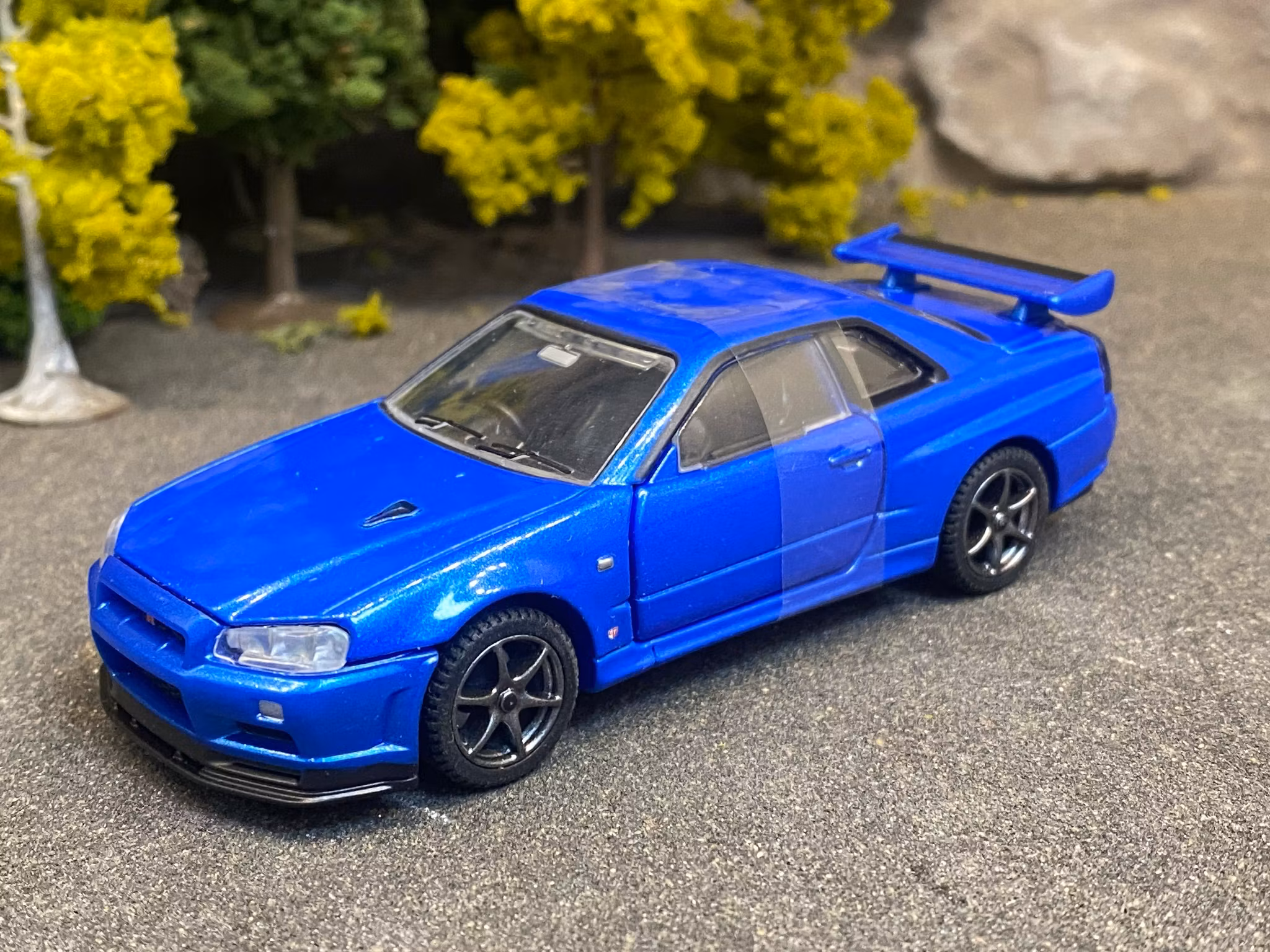 Skala 1/43 Nissan Skyline GT-R V-Spec II, Blue fr Tomica Premium RS
