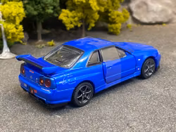 Skala 1/43 Nissan Skyline GT-R V-Spec II, Blue fr Tomica Premium RS