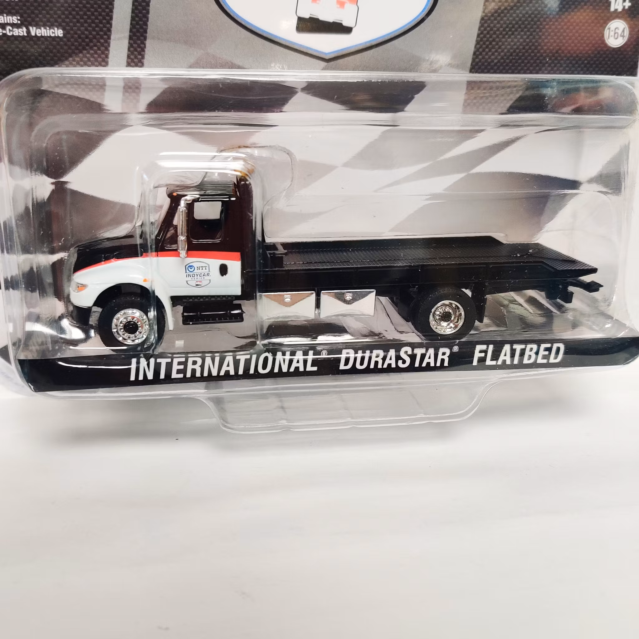 Skala 1/64 Greenlight Excl. - International DuraStar Flatbed - NTT Indycar Series Lim.Ed