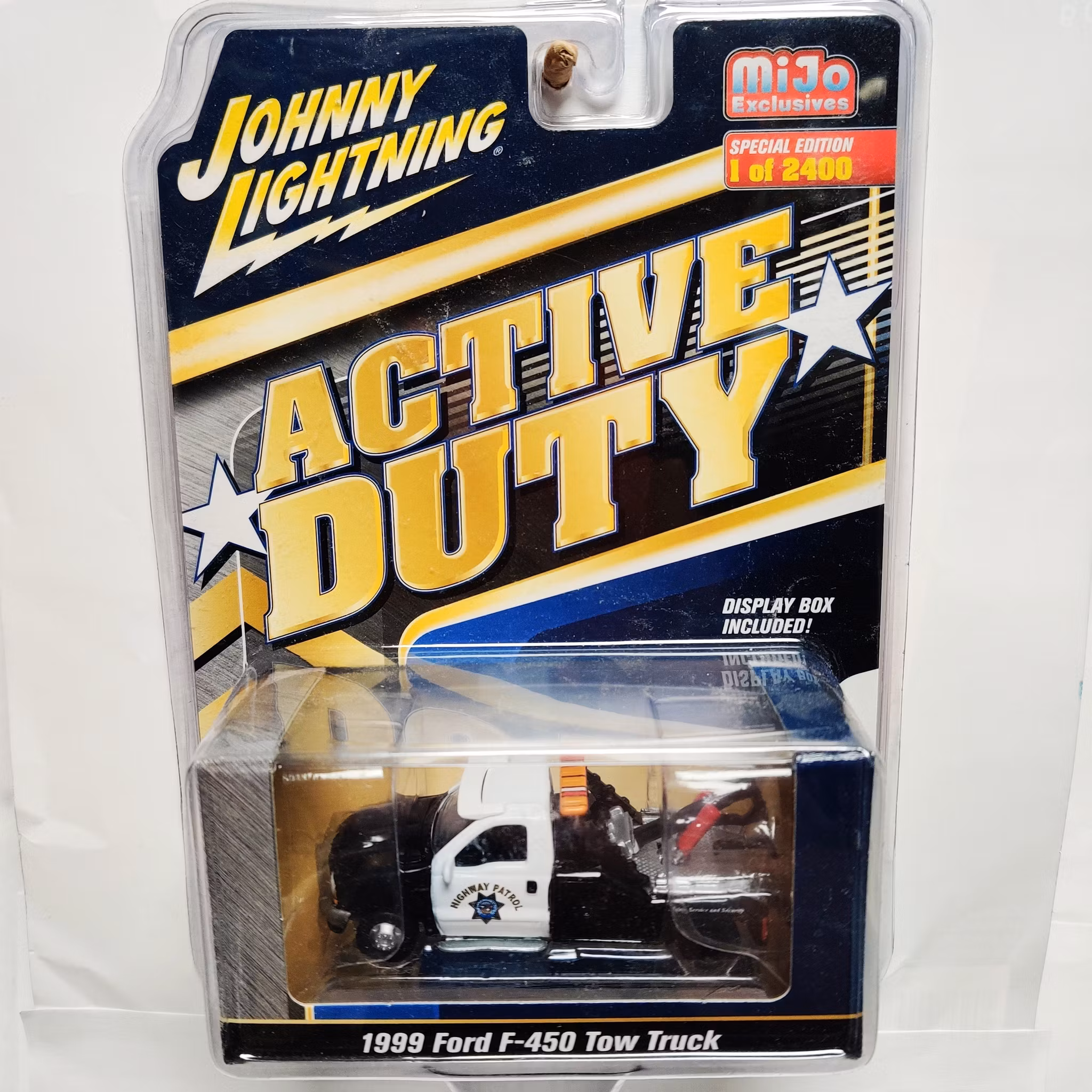 Skala 1/64 Greenlight "Active Duty" Ford F-450 Tow Truck 1999