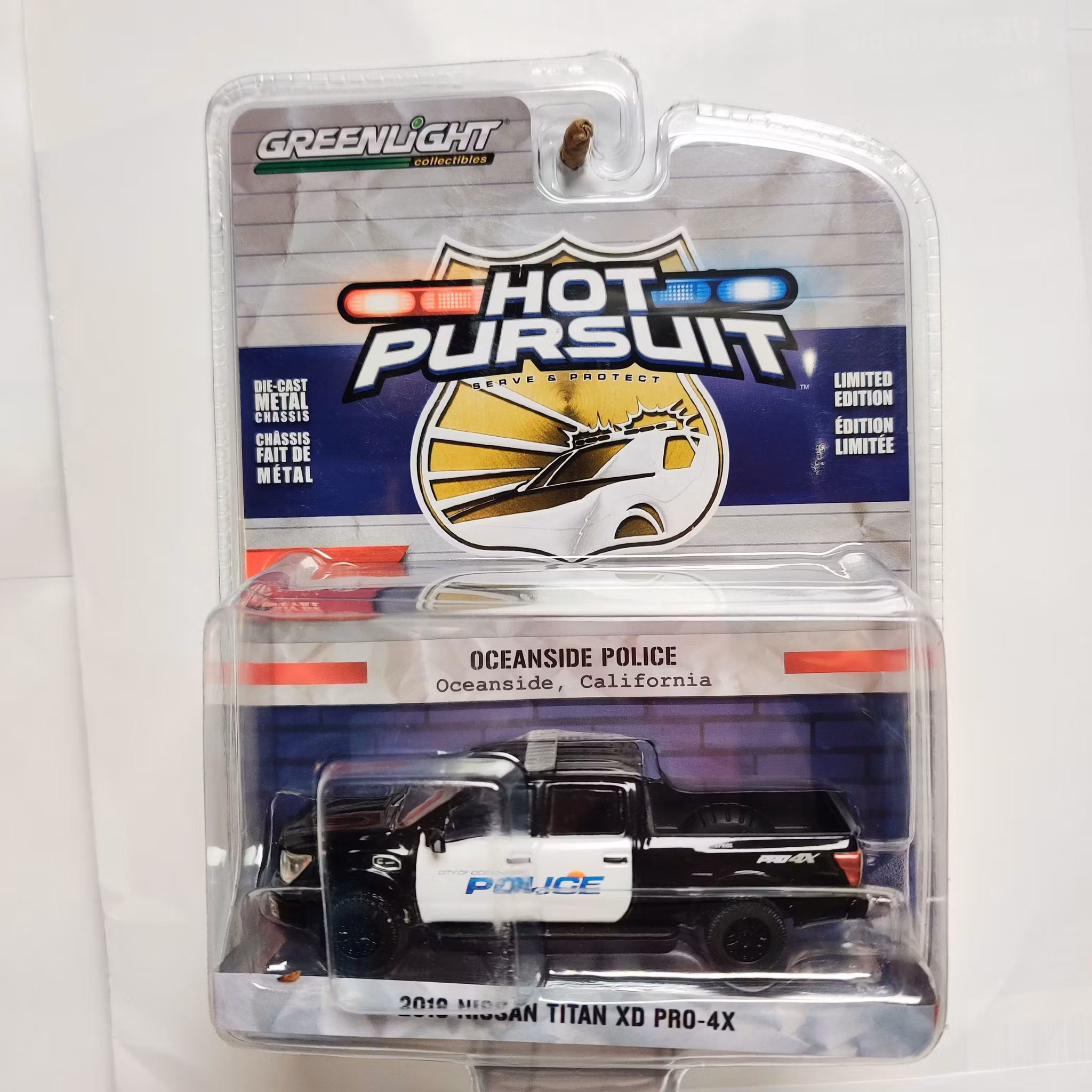 Skala 1/64 Greenlight "Hot Pursuit" 2018 Nissan Titan XD PRO-4X S.39