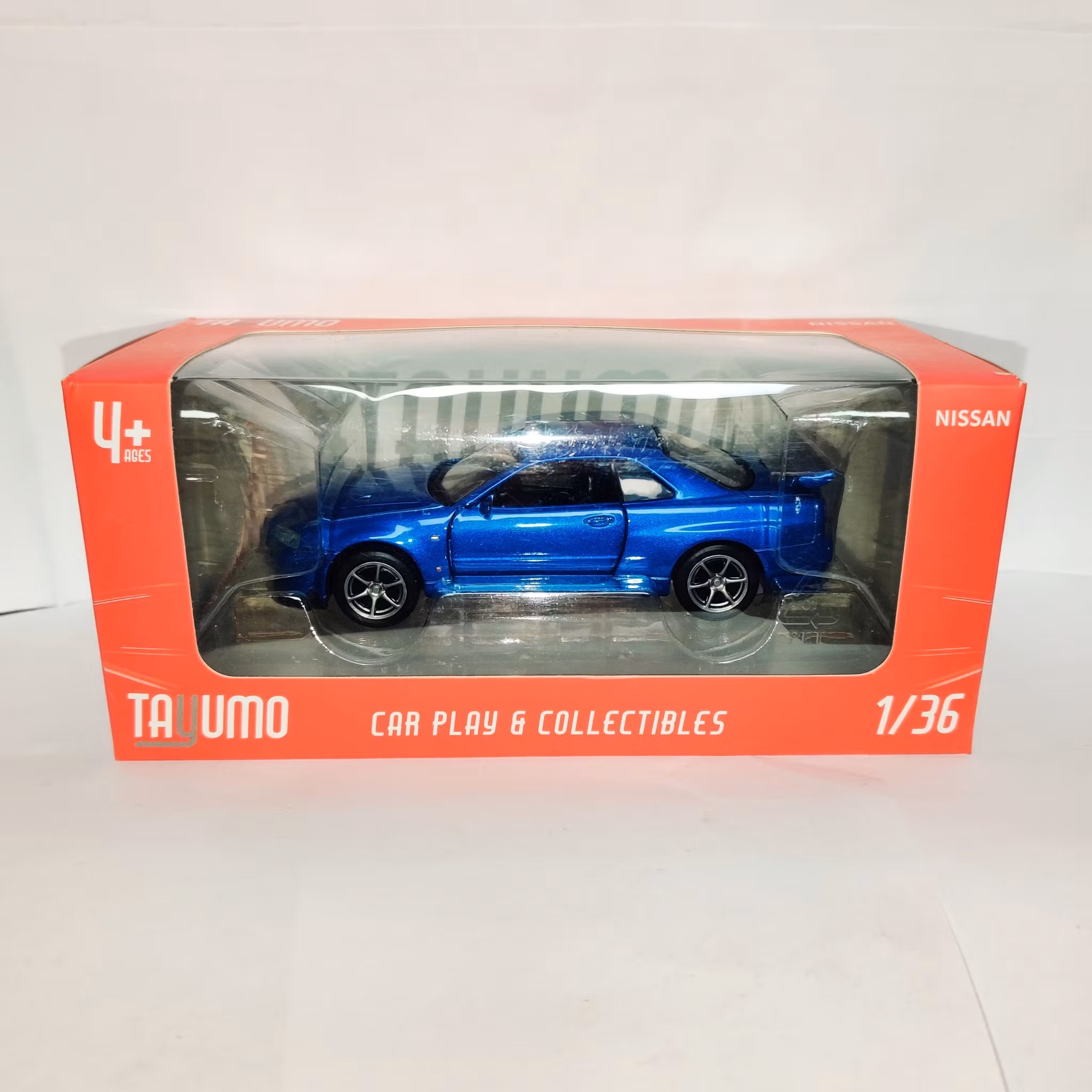 Skala 1/36 Nissan GT-R34 V-Spec II, vänsterstyrd, Blå metalic från Tayumo