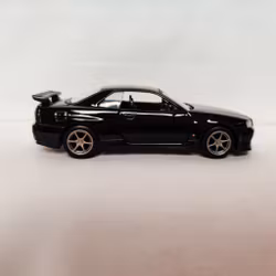 Skala 1/36 Nissan GT-R34 V-Spec II, vänsterstyrd, Svart från Tayumo