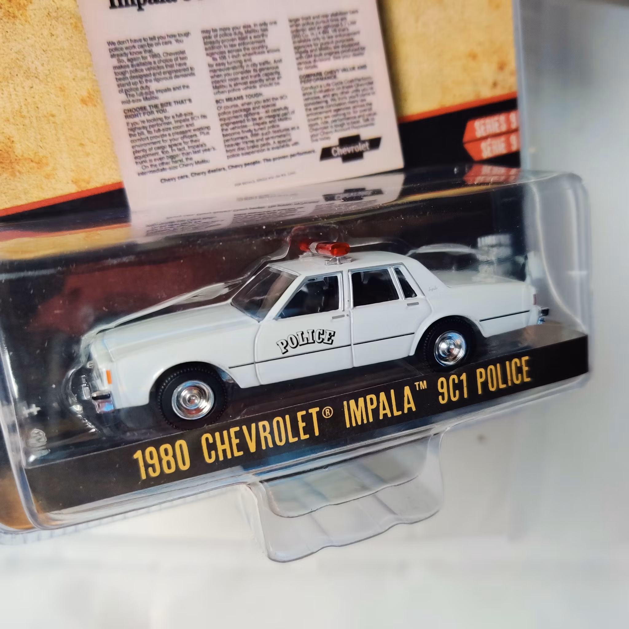 Skala 1/64 Greenlight "Vintage AD Cars" 1980 Chevrolet Impala 9C1 Police Ser.9