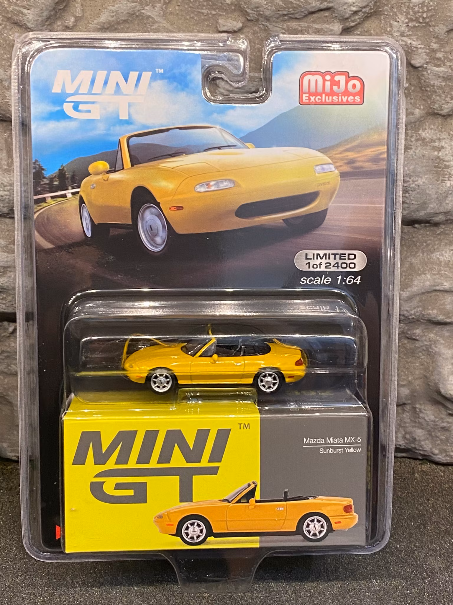 Skala 1/64 Mazda Miata MX-5 (NA) Sunburst Yellow (392) MiJo fr MINI GT Limited Edition