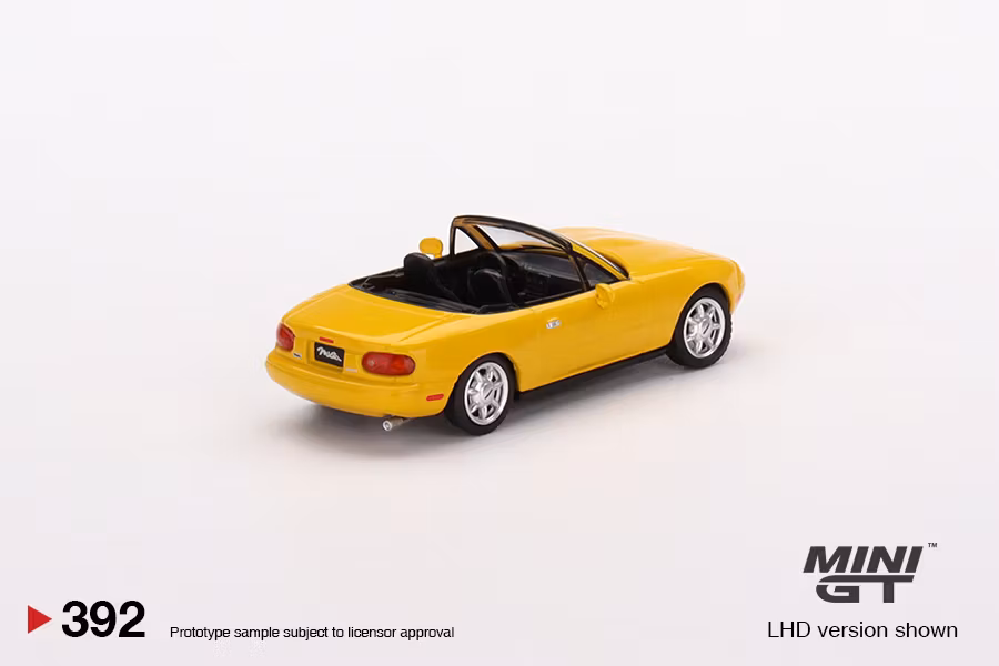 Skala 1/64 Mazda Miata MX-5 (NA) Sunburst Yellow (392) MiJo fr MINI GT Limited Edition