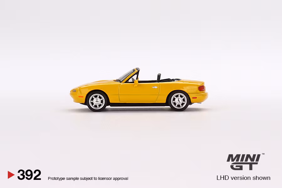 Skala 1/64 Mazda Miata MX-5 (NA) Sunburst Yellow (392) MiJo fr MINI GT Limited Edition