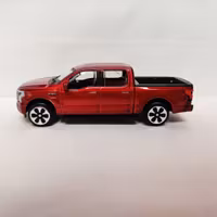 Skala 1/43 Ford F-150 Lightning Vit/orange fr Bburago