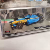 Skala 1/43 Formula 1, Renault R24, 2004, Jarno Trulli m/w tidning/booklet