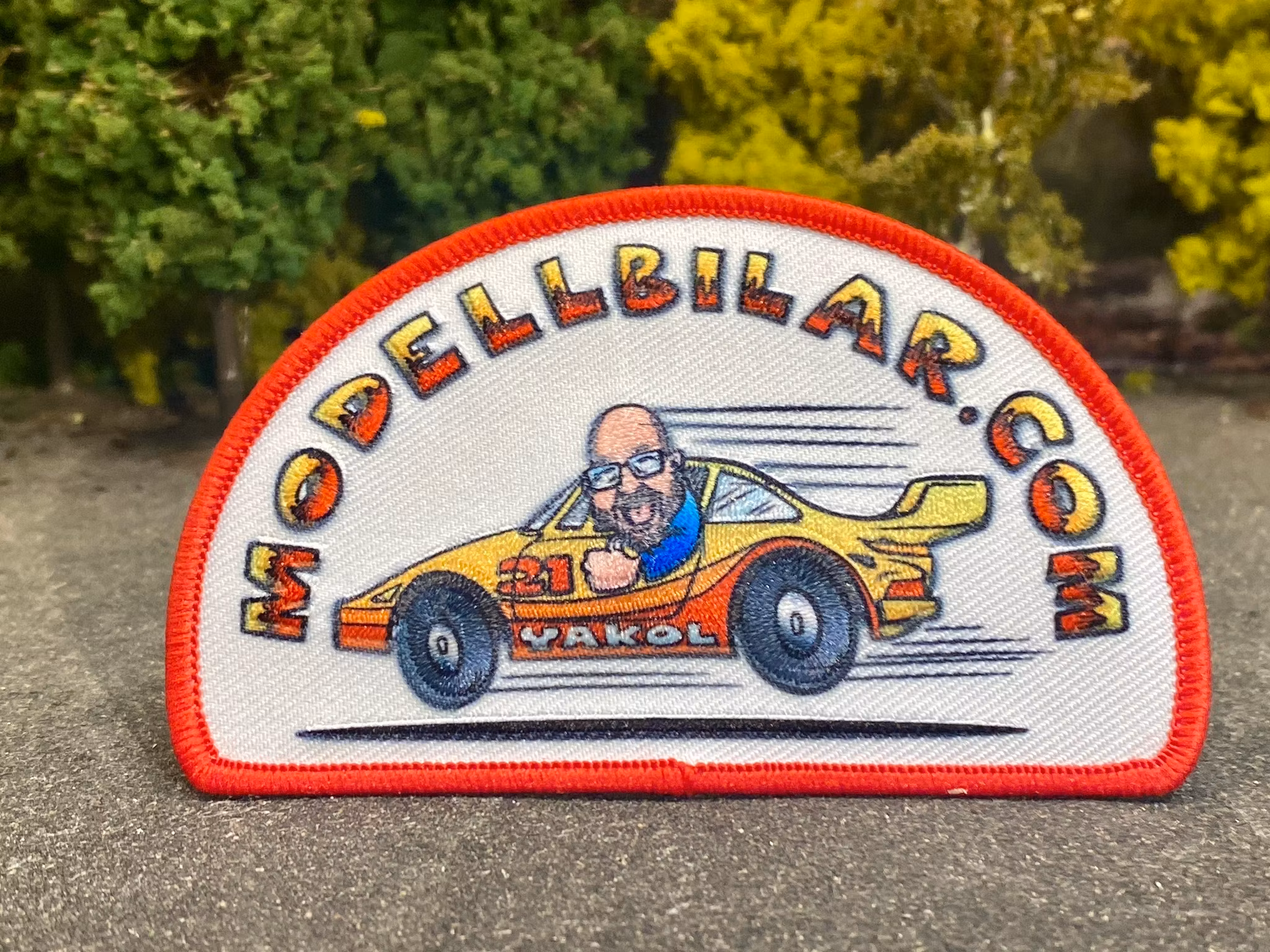 Merchandise: "Modellbilar.com" 95x57 mm for clothes and caps