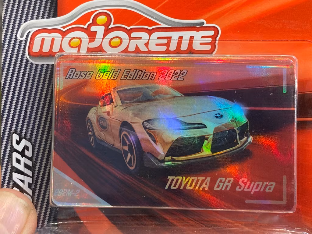 Skala 1/64 fr Majorette - Premium Cars: Toyota GR Supra Rose Gold Ed. 2022