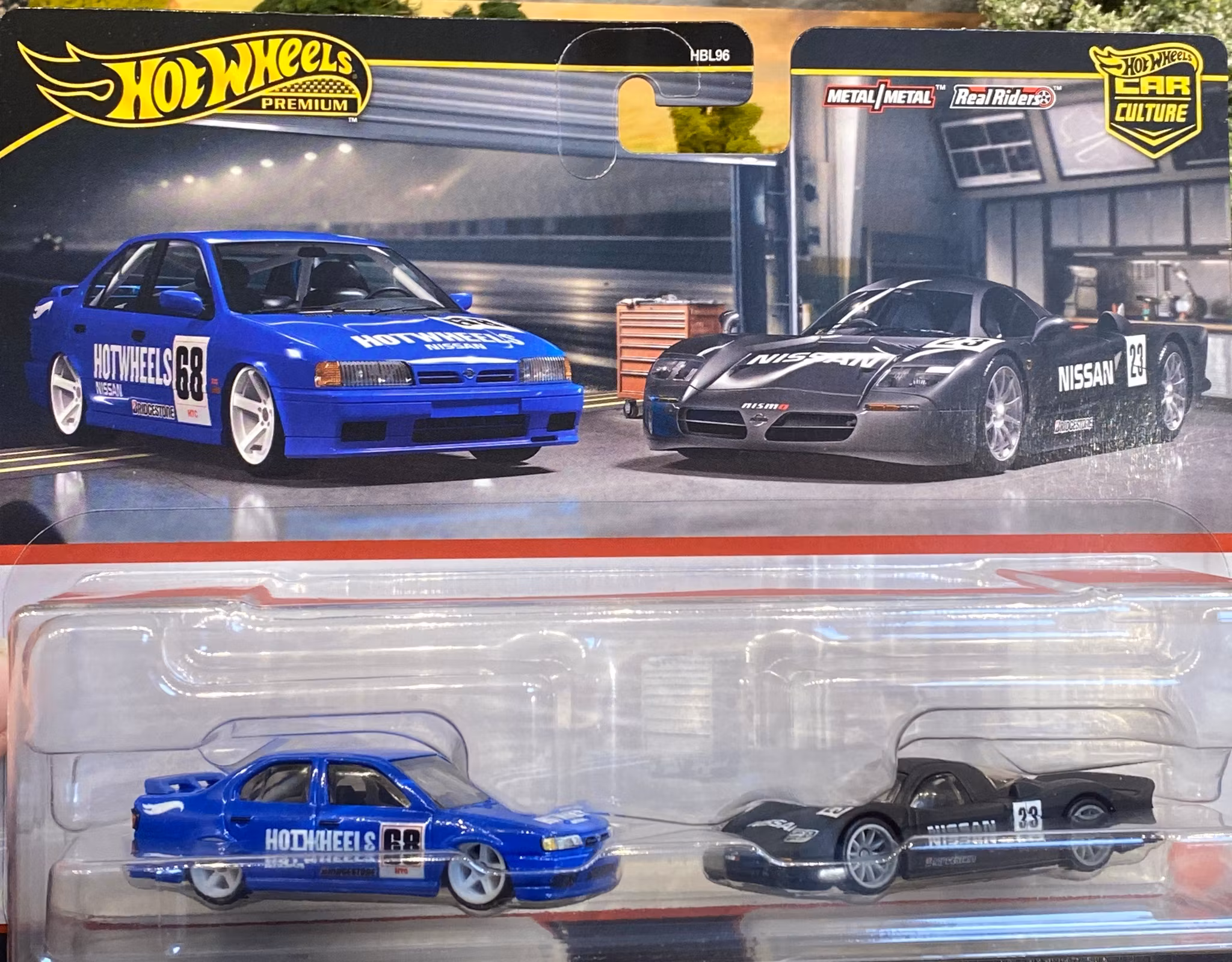 Skala 1/64 Hot Wheels PREMIUM 2-pack: Nissan Primera & R390 GT1