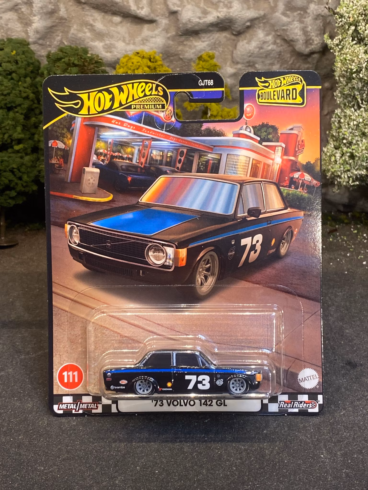 Skala 1/64 Hot Wheels Premium, Boulevard: Volvo 142 GL, Black/blue