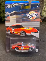 Skala 1/64 Hot Wheels - Vintage Racing Club: Toyota 2000GT #3 Red/yellow