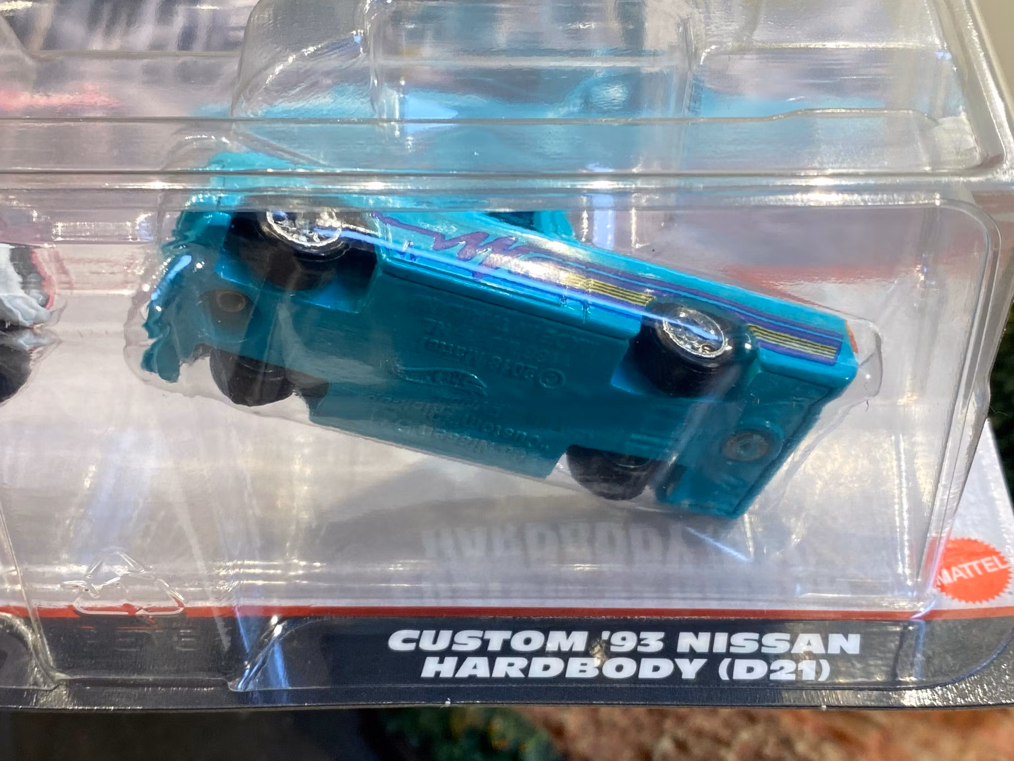 Skala 1/64 Hot Wheels Premium 2-pack: Datsun Sunny B120 75' & Custom '93 Nissan Hardbody (D21)