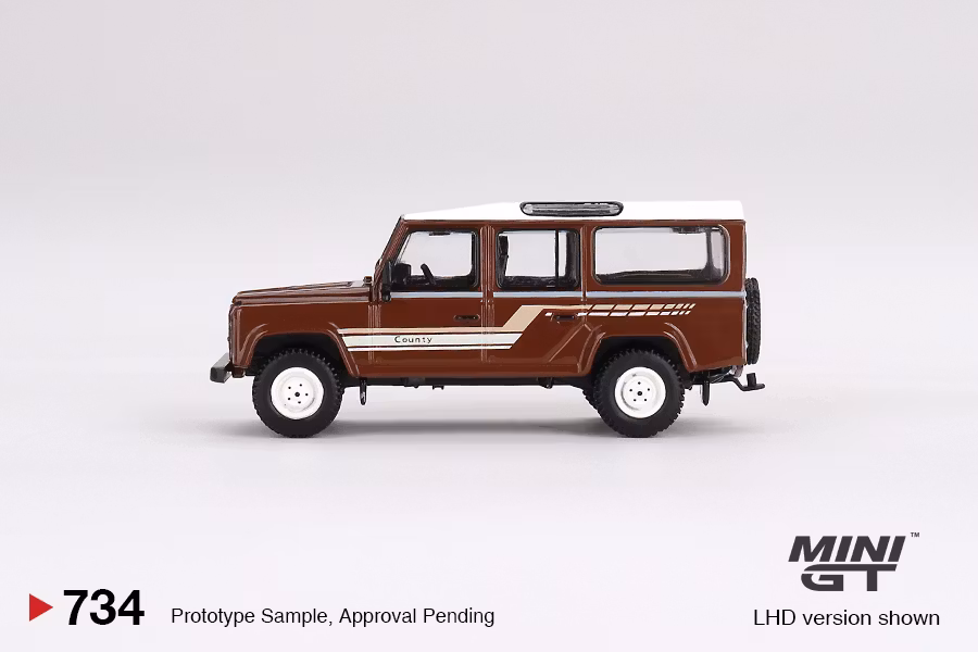 Skala 1/64 Land Rover Defender 110 1985 County Station Wagon Russet Brown fr MINI GT (734)