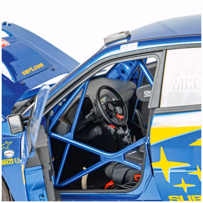 Skala 1/8 Subaru Impreza Solberg/Mills in metal, w light, etc. fr Ixo Collections - Diamant8