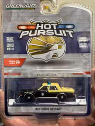 Skala 1/64 Hot Pursuit - 1983 Dodge Diplomat, Florida Highway Patrol fr Greenlight