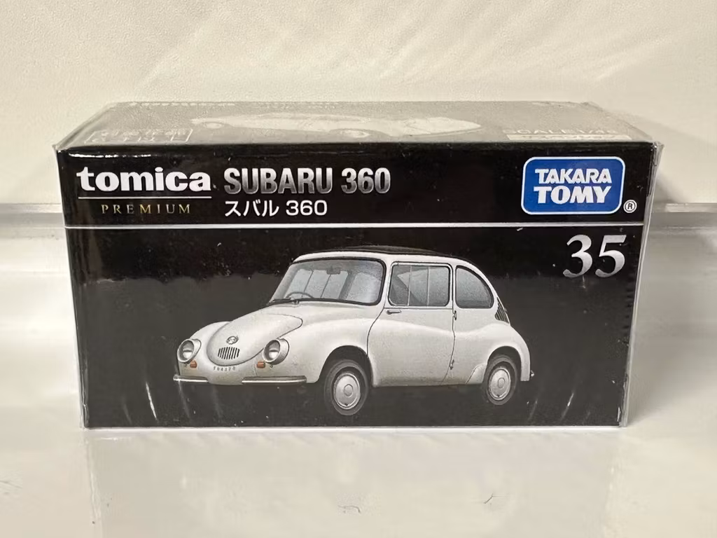 Skala 1/64 fr Tomica Premium: Subaru 360 - White