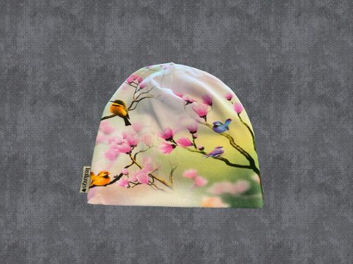 Små fåglar med rosa blommor
