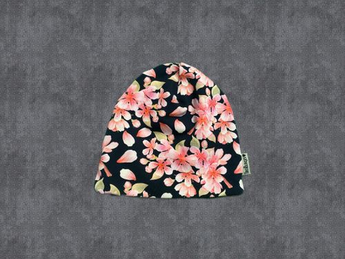 Svart botten med rosa blommor