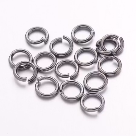 Bindringar av mässing, 6mm, svarta (100st)