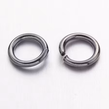 Bindringar av mässing, 6mm, svarta (100st)