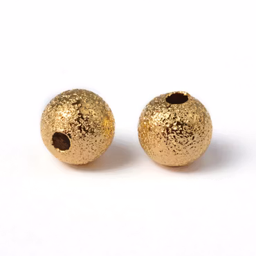 Mellandelar stardust av mässing guld 4 mm (50st)