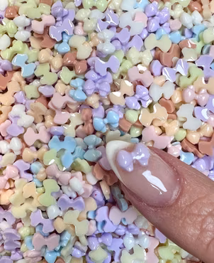 Söta vita rosetter för Nailart eller dekoration, 6x10mm (100st)