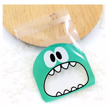 Cellofanpåsar med grönt monster, 10x7cm (10st)