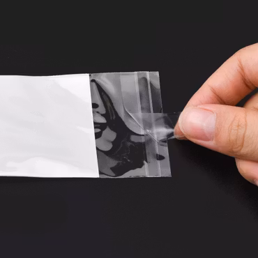 Cellofanpåsar med vit pärlfilm hål och limremsa 10x5cm 50st