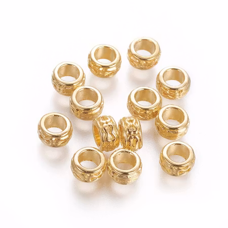 Rondell tibetisk av blandmetall guld 6x3 mm (25st)