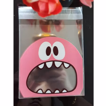 Cellofanpåsar med rosa monster, 10x7cm (10st)