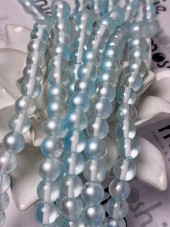 Sträng glaspärlor, night and day clear, light turquoise, 10mm (85st)