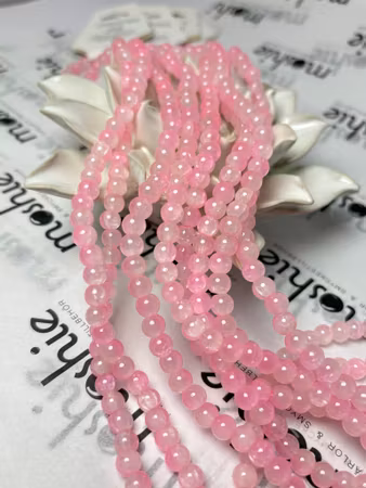 Sträng med dovt krackelerade jadeimitation av glas, rosa, 6mm (147st)