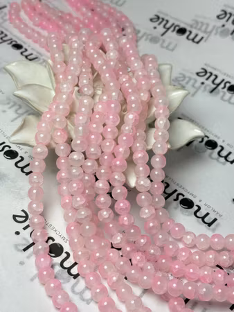 Sträng med dovt krackelerade jadeimitation av glas, rosa, 8mm (104st)