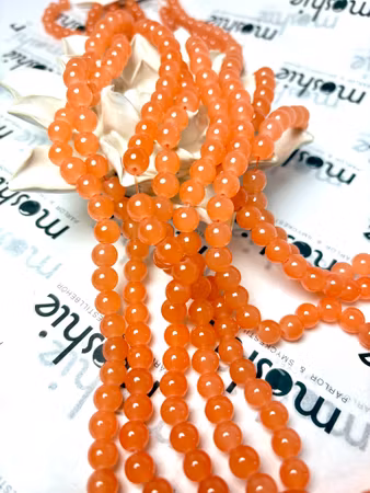Sträng med glaspärlor, Jadeimitation, dovt orange, 8,5mm (100st)