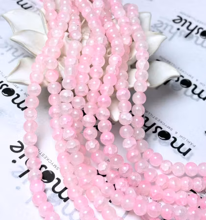 Sträng med dovt krackelerade jadeimitation av glas, rosa, 8mm (104st)