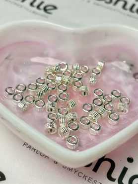 Rondell tibetisk rutmönster av blandmetall silver 5x3 mm (50st)