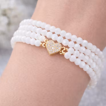 Facetterade runda glaspärlor vit jadeimitation 4mm 90st